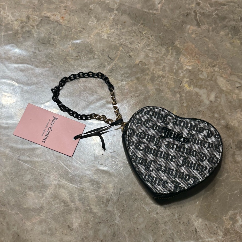 New Juicy Couture heart-shaped wristlet coin purse in black.
New with tags - Picture 3 of 5